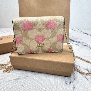 C's Classic Chain Flip Mini Wallet Is a Trendyy and Versatile Coin Purse That Can Be Worn Cross-Body and Comes in Multiple Colors
