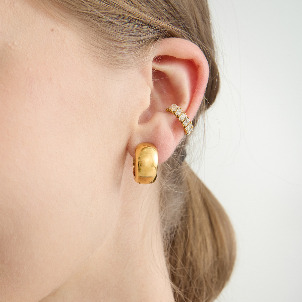 Wanxing europa y americana acero inoxidable galvanizado 18K oro blanco simple orejas de zircón transfronterizas venta caliente universal no desvanecerse mujeres
