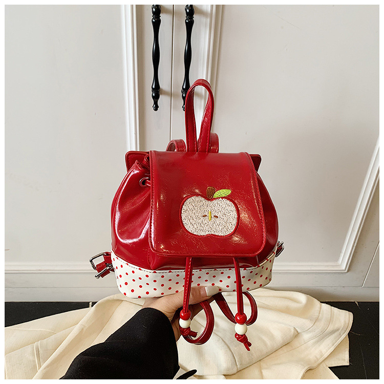 2025 nueva mochila infantil de alto valor de cara caricatura adorable manzana pequeña mochila para niños y niñas, mochila para niños