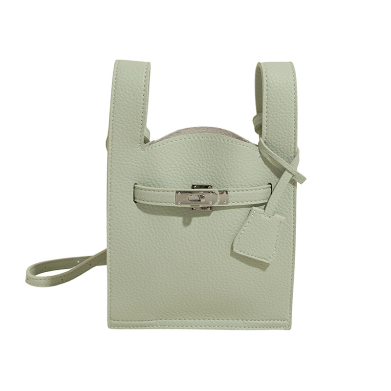 Bolsos populares de este año 2025 primavera y verano nuevo bolso femenino bolso de hombro de diseño de nicho bolso de mensajero con patrón de lichi fresco