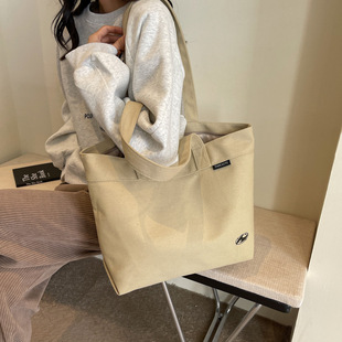 Canvas bag women's large capacity new fashionable casual all-match simple College student class commuter portable shoulder bag