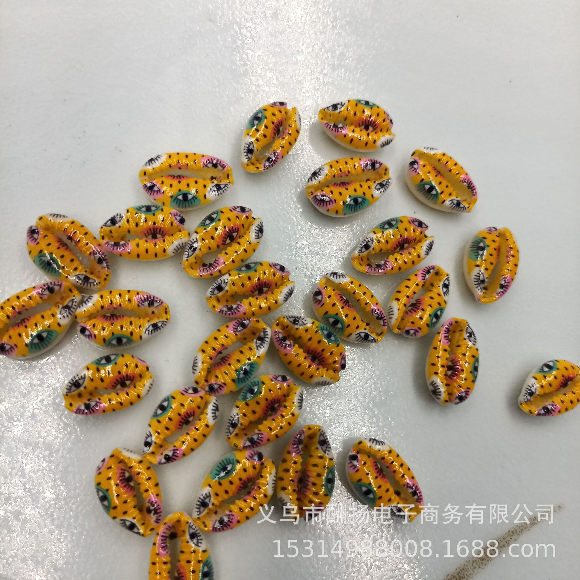 New design with small eyes, yellow background with black dots, 1 piece.