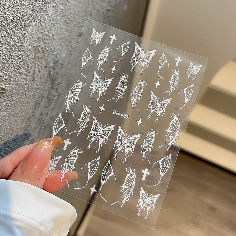 液体の蝶のネイルシールの立体レーザーと金銀の白黒の蝶の薄い靭性帯のゴムを背負って花の爪を貼って卸売りを貼ります。|undefined