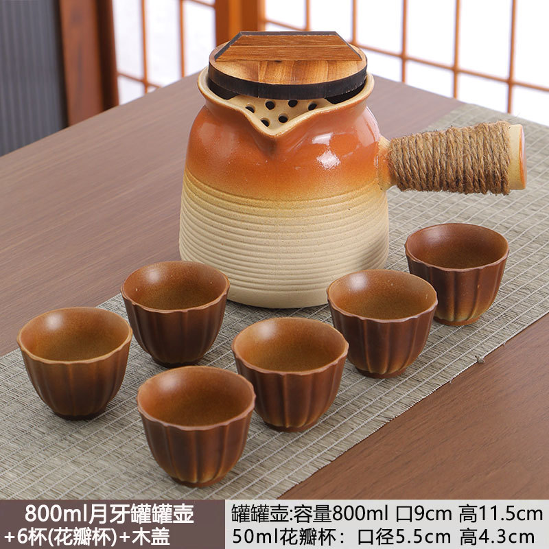 Tetera en una estufa, tarros de té con leche a la parrilla, ollas especiales, utensilios de cerámica de cocción en seco para el hogar, juego completo de juegos de té