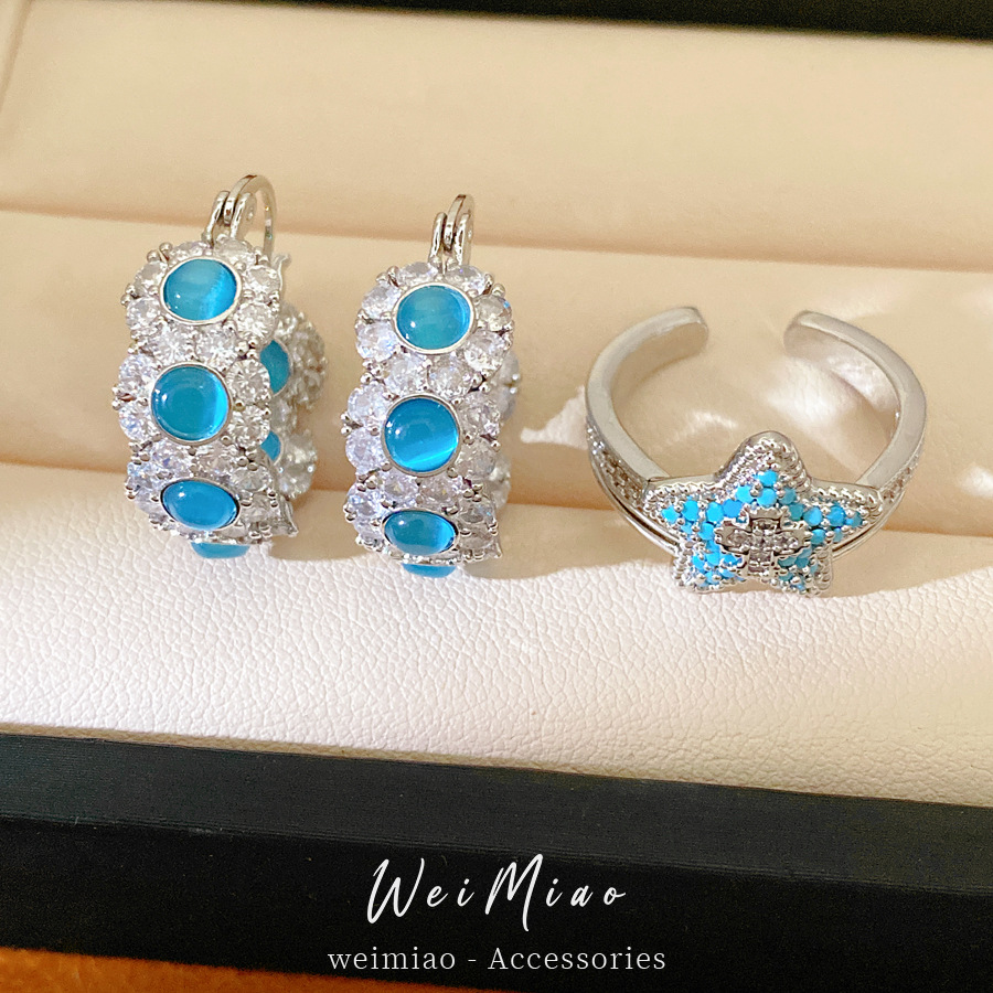 Azul, piedra de ojo de gato, perfiles de orejas redondos, temperamento de personalidad, pendientes de lujo ligero, conjunto de joyas de alta calidad.