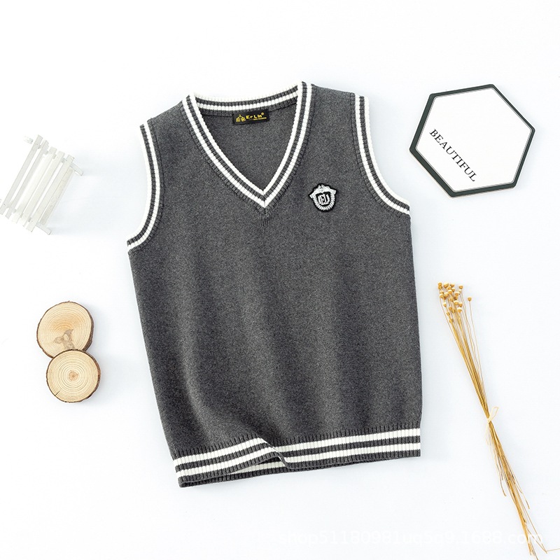 Chaleco de punto estilo universitario coreano para niños, primavera y otoño 2025, chaleco de algodón con cuello en V para niños, suéter para estudiantes de primaria, venta al por mayor.