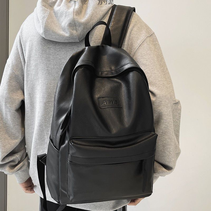 书包男韩版大学生背质休闲大容量双肩包高中生电脑包一件批发