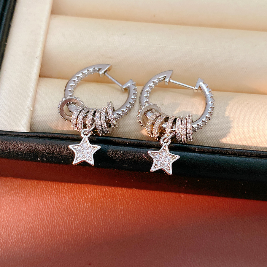 Oreja abrochada - plata - colgante de estrella