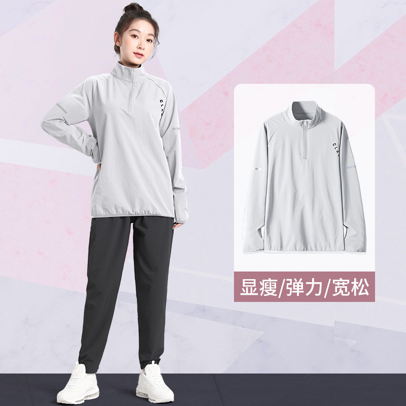 Camiseta deportiva de mujeres running primavera entrenamiento deportivo ropa de secado rápida suelta fitness manga larga gran chaqueta de medio cremallera