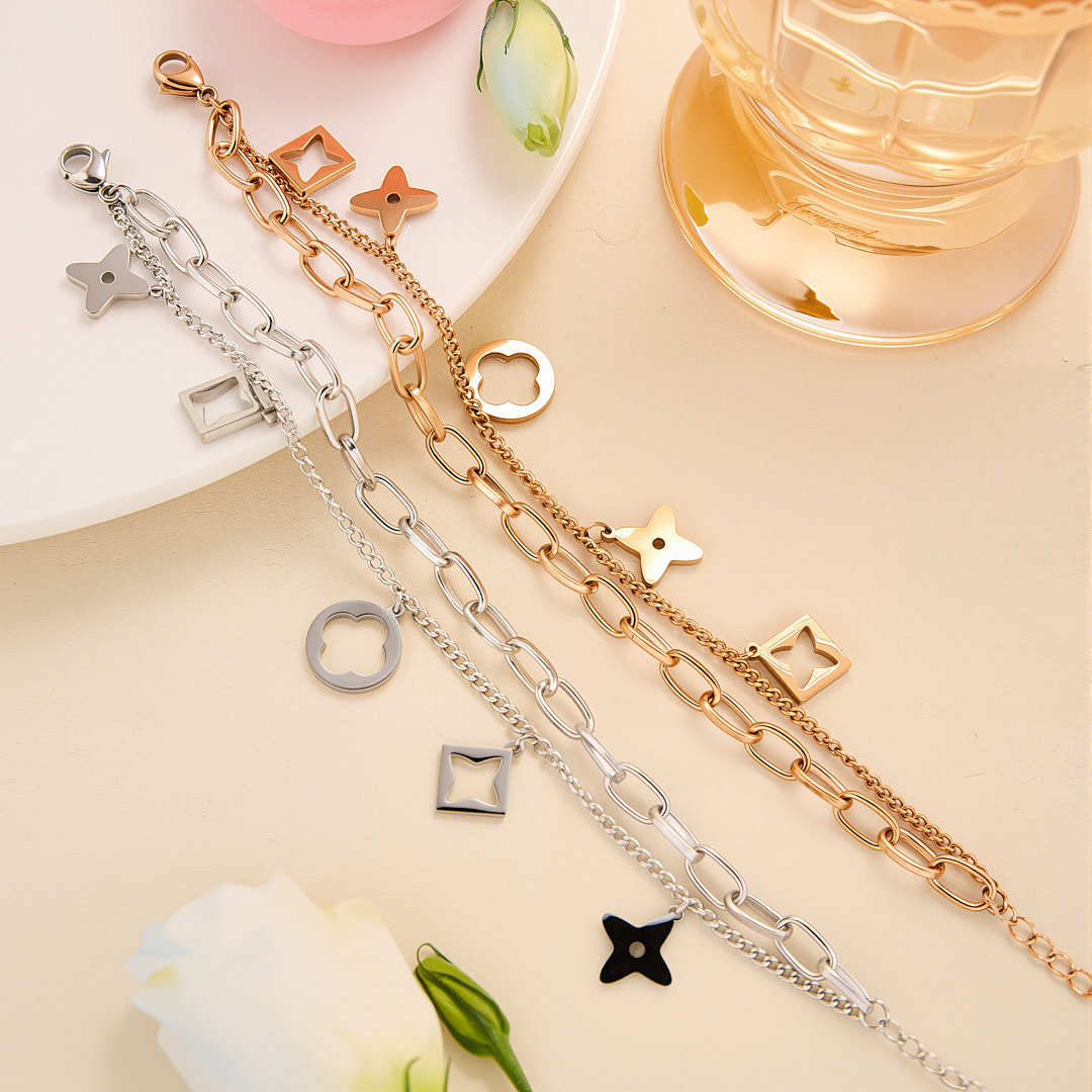 Luxury full-body titanium steel double-layer bracelet women's light luxury high-end hollow-out four-leaf clover bracelet women's cross-border jewelry wholesale