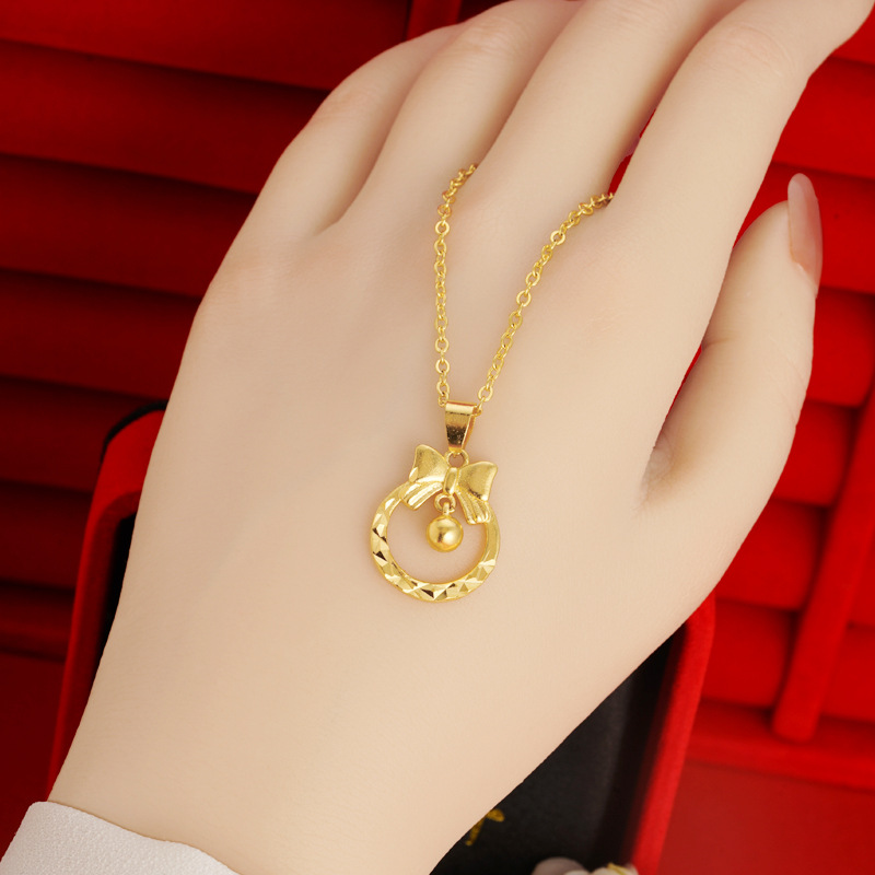 Princesa en la carrera arco campana colgante lindo todo partido donut nicho dulce DIY joyería Vietnam arena oro