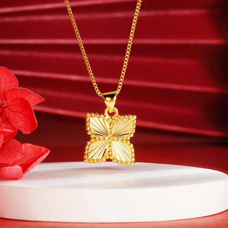 Oro trébol de cuatro hojas colgante antiguo chapado en oro de la flor de las mujeres elegante todo partido transmisión en vivo caliente suministro al por mayor Yiwu