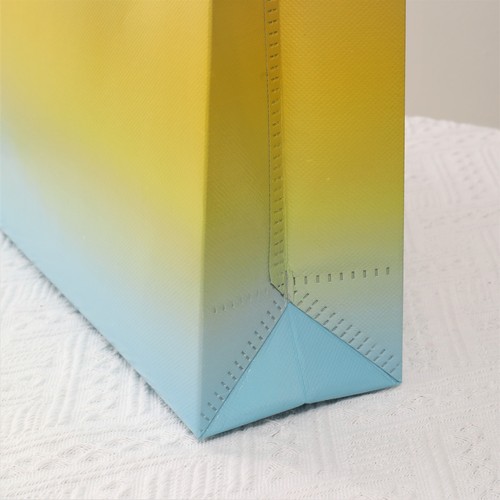 Laser coated clothing gift packaging bags, multi-color non-woven bags, advertising shopping handbags with logo printing