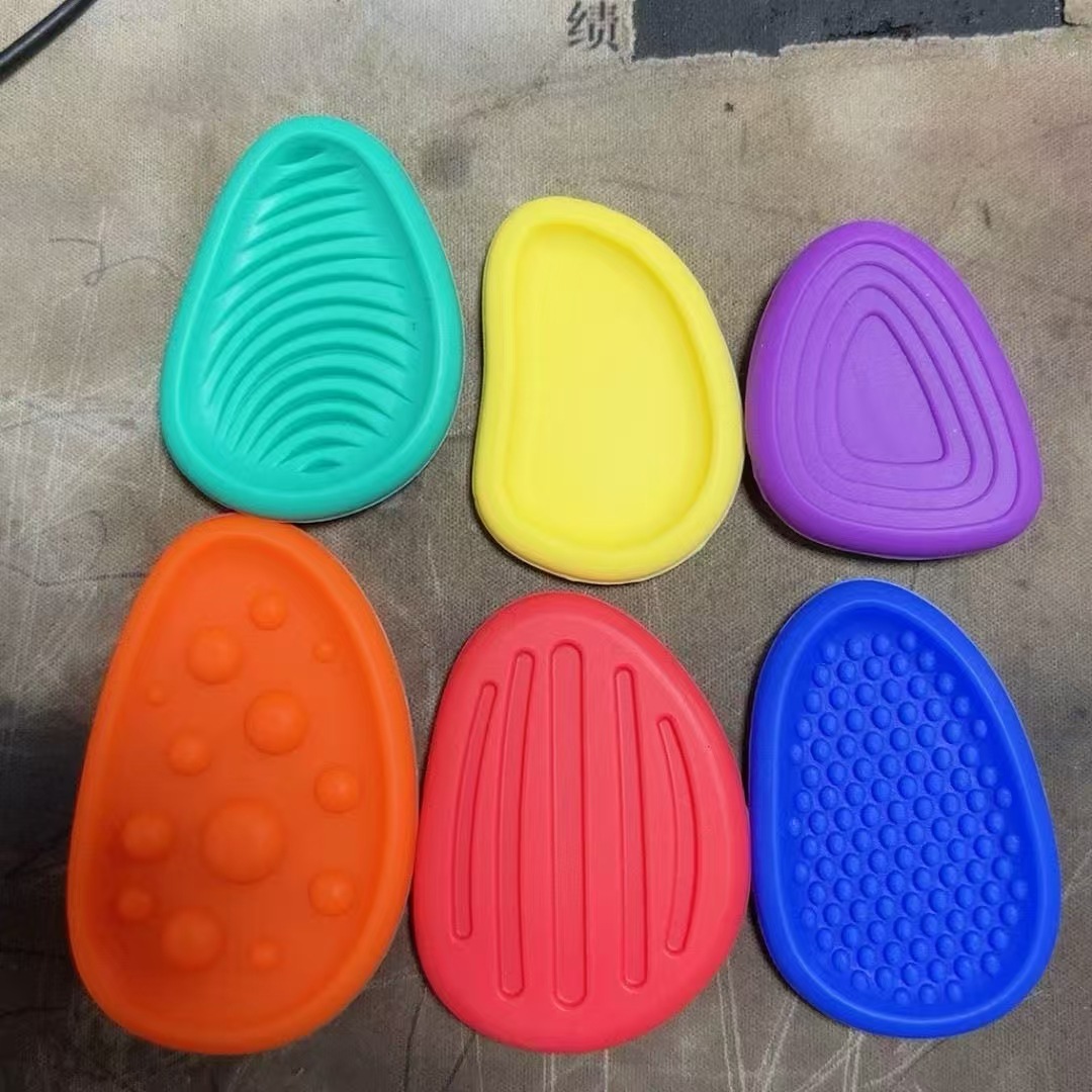 Nuevos productos transfronterizos para aliviar la compresión Guanshi, entrenamiento de fuerza para niños, piedra de textura para aliviar la ansiedad, placa táctil de textura suave