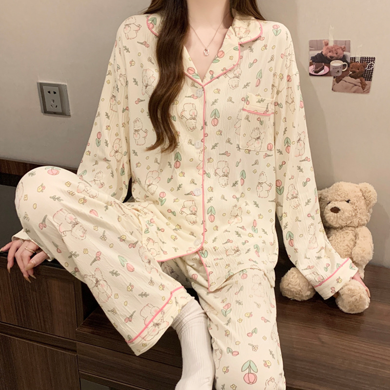 蝶結びのさくらんぼのプリントの女性のパジャマの春と秋の新型のカーディガンの長袖のズボンの部屋の服のスーツは実際に卸売りをたたきます。|undefined