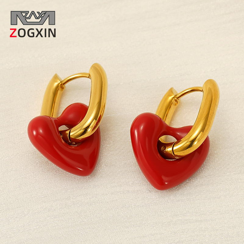 Nicho de diseño transfronterizo europeo y americano amor rojo aretes de acero de titanio de alta sensación de auriculares 2024 nuevos auriculares para mujeres