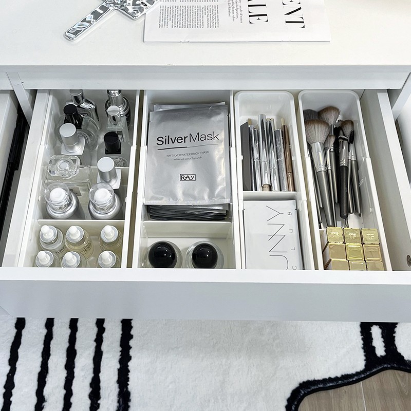 Telescopic cosmetic storage box, storage system, brush, dressing table, lipstick