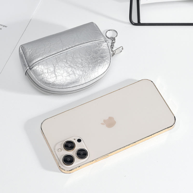 2025 bolso de cambio de cremallera retro compacto y exquisito bolso de almacenamiento de llaves mini bolso de tarjetas de mano bolso de monedas