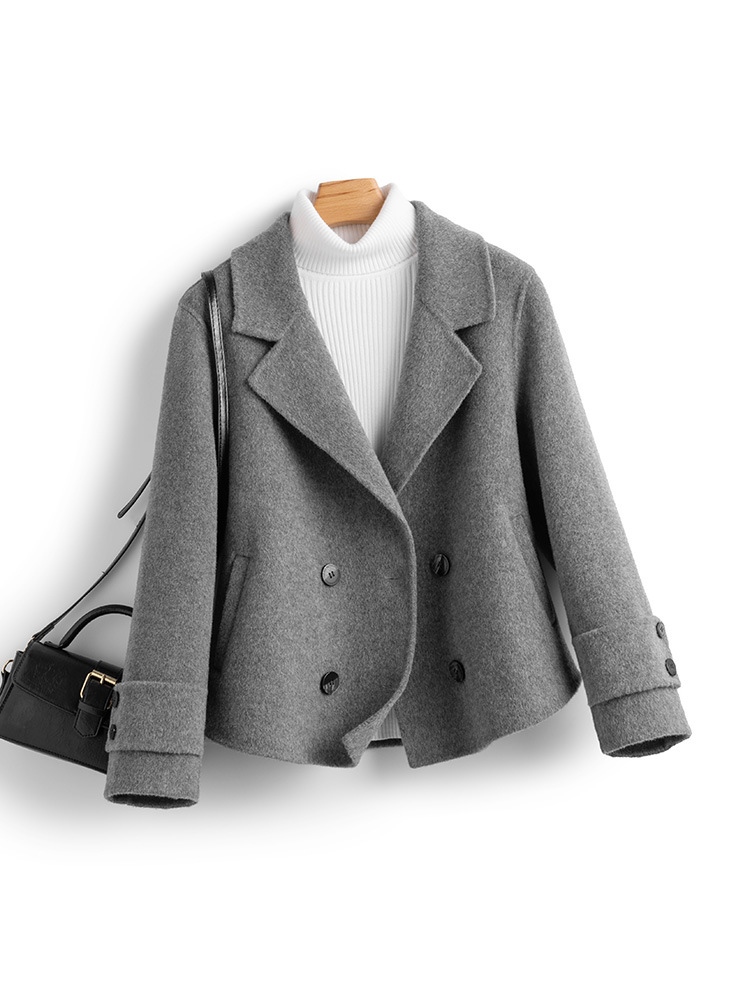 秋冬の新型の100% ウールの両面はコートのスーツの女性の短いタイプの修身のヘボン風の小さい背が高くて、百合があります。