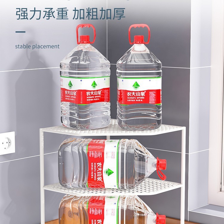 台所の棚のテーブルの角の鍋の収納棚の下の水槽の鍋棚の食器棚の中に鍋の階層棚の神器を入れます。|undefined