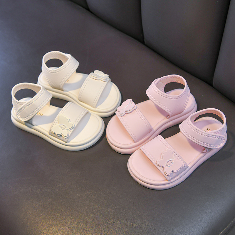 Zapatos casuales de moda de niñas versátiles 2026 verano nuevos niños sandalias de dedos abiertos huecos zapatos de princesa mariposa