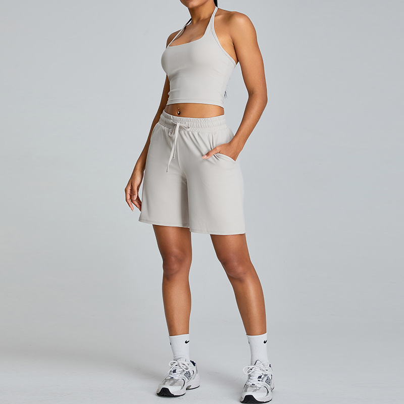 Primavera y verano nuevo estilo de moda al aire libre ocio juego deportivo mujer cuello colgante hermosa ropa de yoga de espalda ajustada juego deportivo fitness