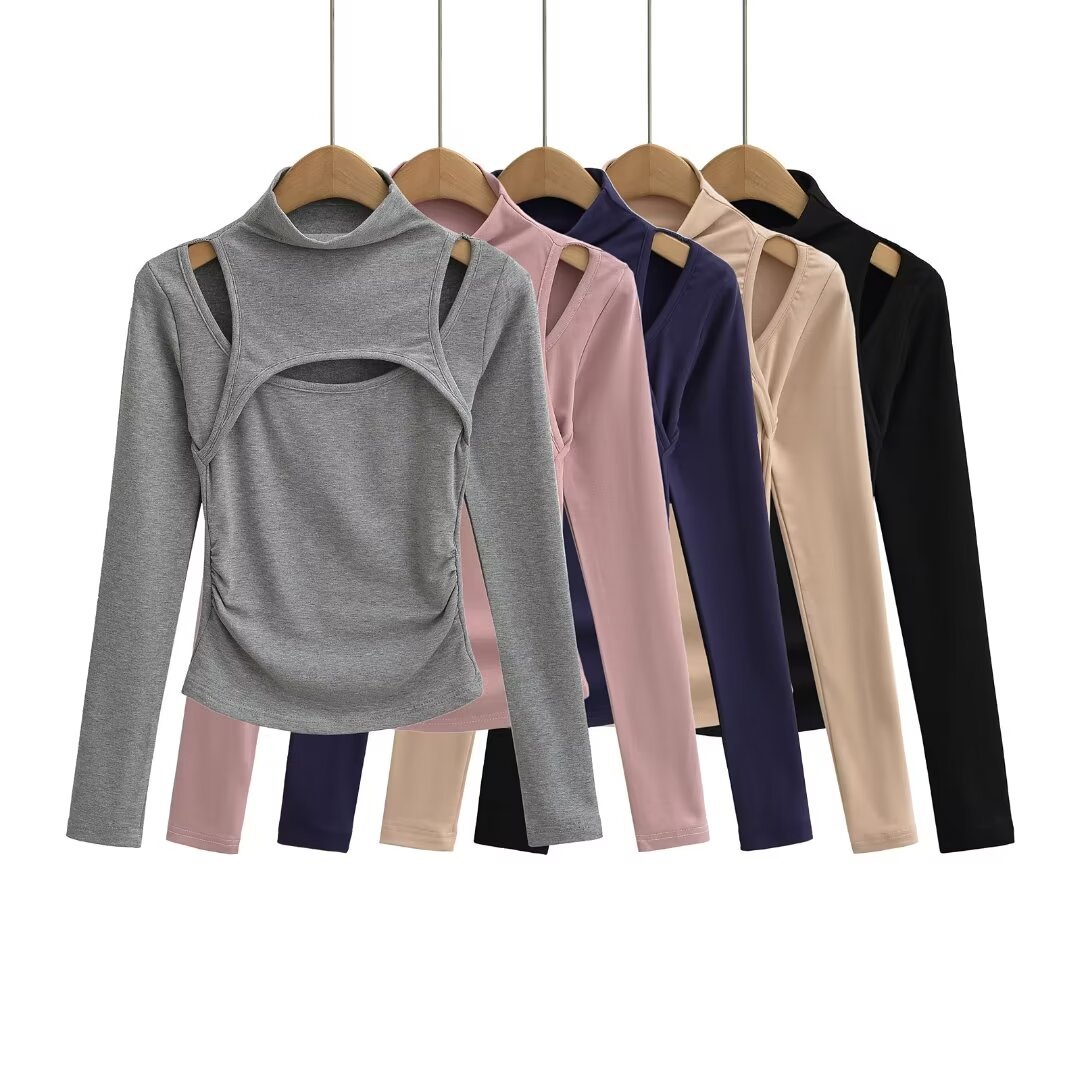 Women's 2024 knitwear with a faux two-piece design, featuring a high neck, cut-out shoulders, and a slightly exposed bust.