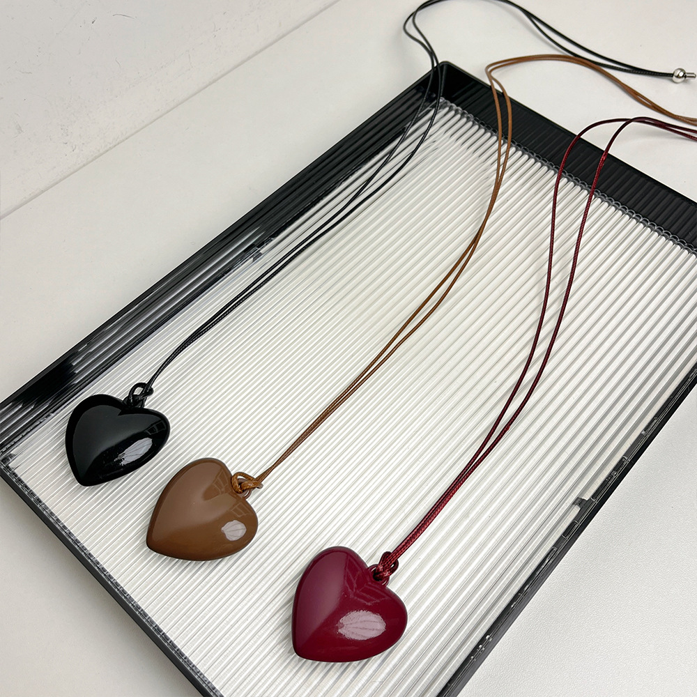 Party, Street Occasion Simple Style Heart Shape Alloy Leather Rope Woven Chain Pendant Necklaces Wholesale