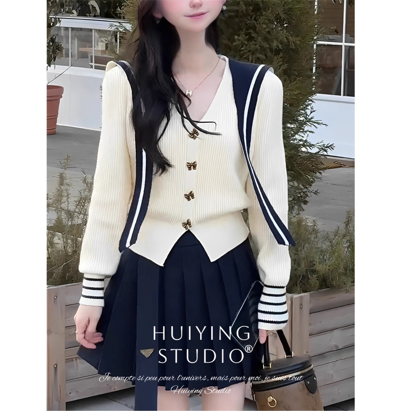 French high-end butterfly buckle navy collar waist sweater women's autumn and winter 2024 design niche knitted cardigan