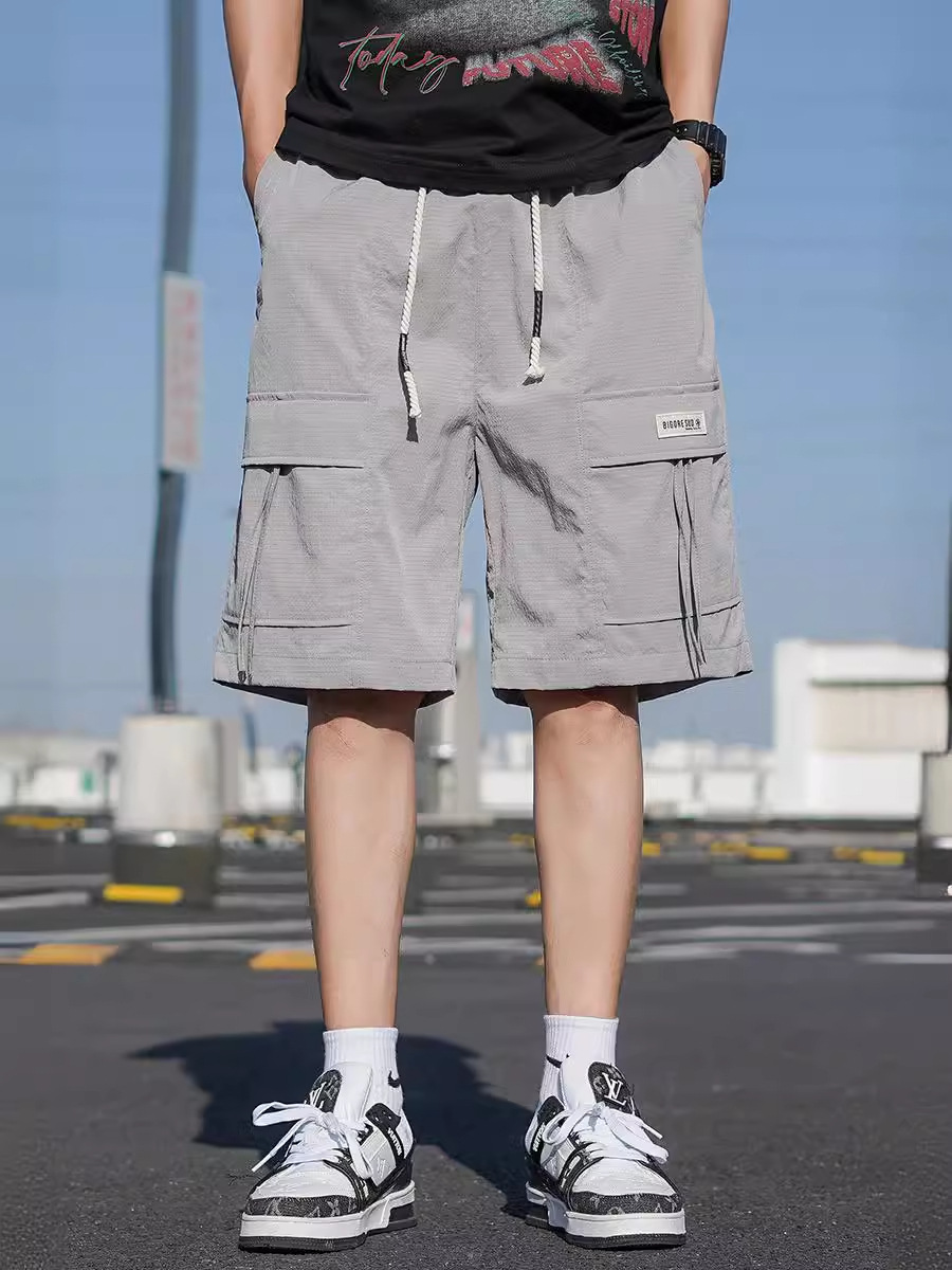 Pantalones cortos de trabajo de verano para hombres, pantalones de secado rápido de hielo, pantalones de tendencia, pantalones largos y casuales.