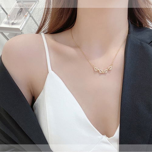 Korean style design steel necklace for women, versatile and non-fading, clavicle chain, light luxury four-leaf clover, love pendant, accessories wholesale