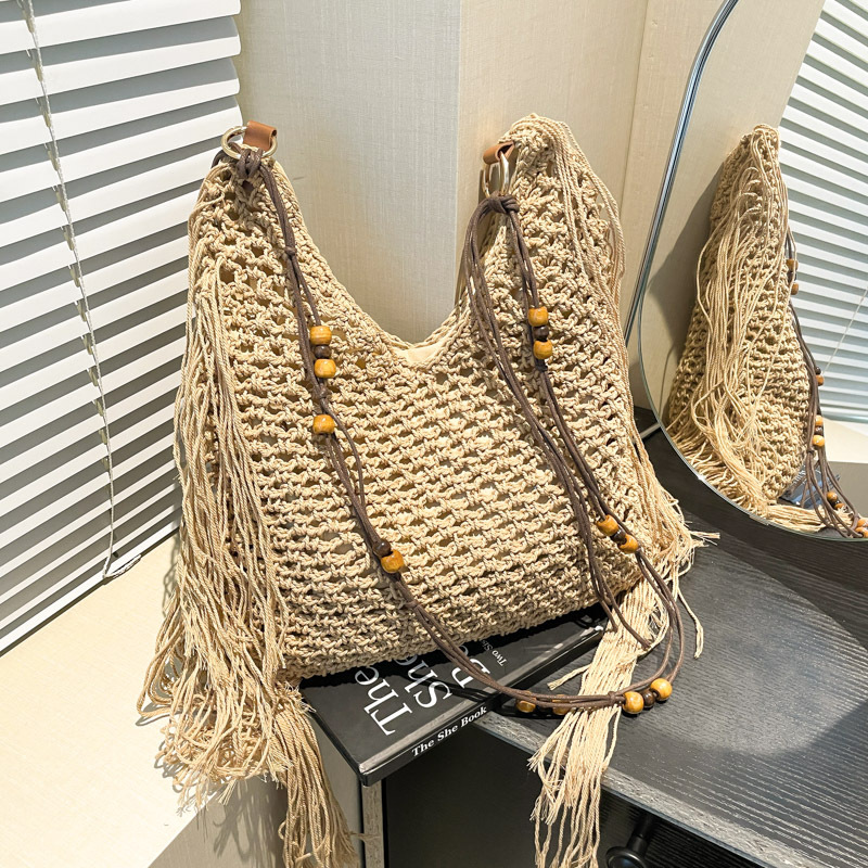 Bolso de vacaciones junto al mar 2025 verano nuevo estilo bolso de hombro tejido con flecos bolso de mensajero de gran capacidad mujer