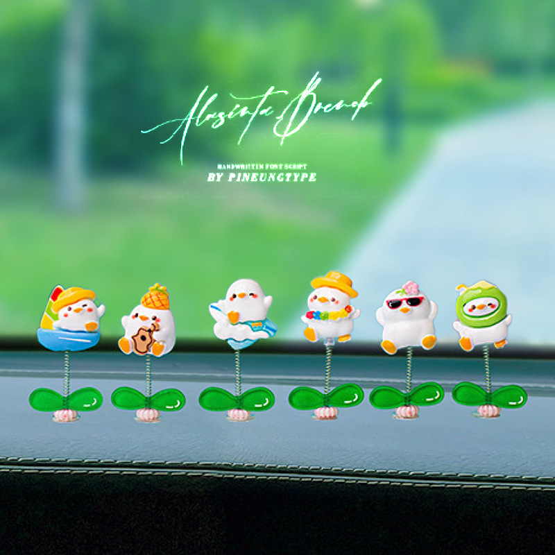 Dibujos animados creativos Consola central de pato lindo Adornos de coche Muñeca de pato pequeño Decoración de escritorio de coche Artículos de decoración