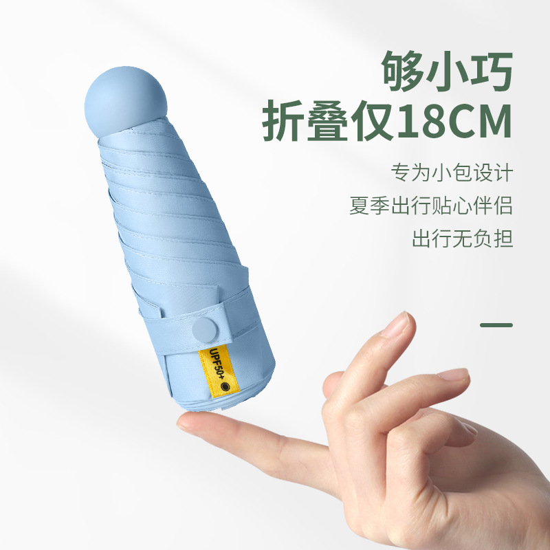 50% de descuento paraguas de cápsula de seis huesos paraguas de Sol de doble uso pequeño paraguas de bolsillo portátil simple pegamento negro paraguas de protección solar al por mayor