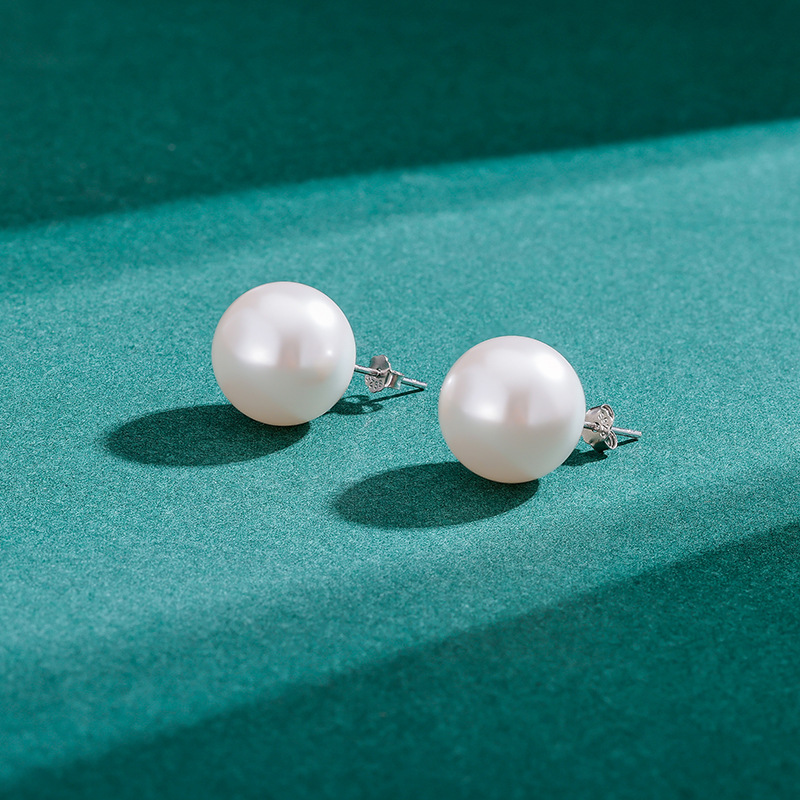 2023 nuevos pendientes de perlas S925 pendientes redondos de plata esterlina de verano de las mujeres de alto grado de luz de lujo retro temperamento pendientes