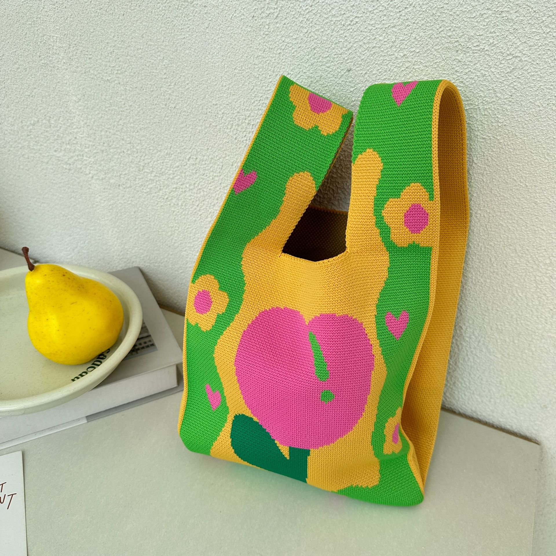 春夏新款韓版小眾設計小清新花朵針織包包女白帶大容量通勤手提包