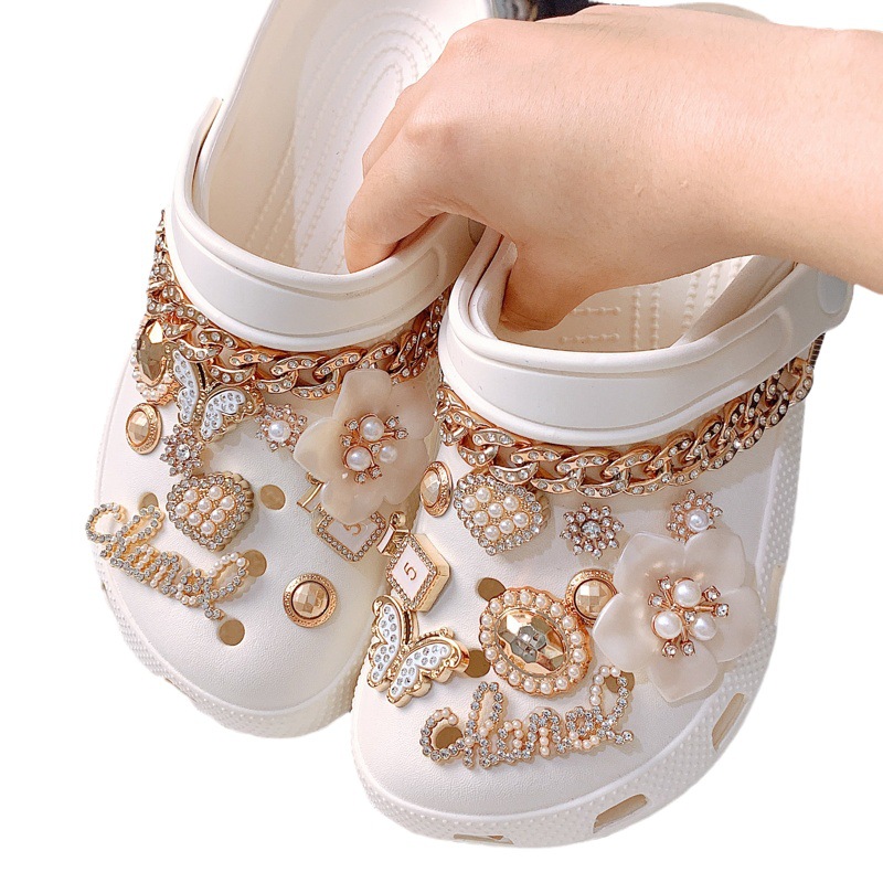Cruz espejo nuevo DIY agujero zapatos diamante Flor Mariposa Chanel estilo botella de agua flor decorativa hebilla accesorios zapato hebilla