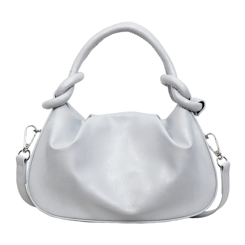 Textura de bolso de mano para mujeres 2026 nueva moda moda diaria de viaje de nicho coreano bolso de hombro