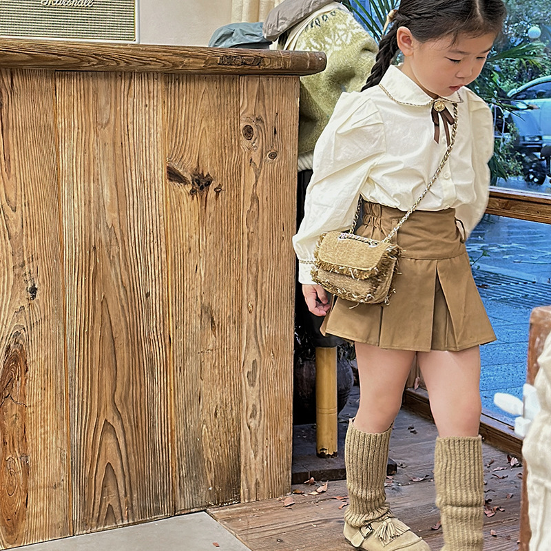 Bolso de hombro de moda para niños y niñas con bordes sin rebaby versión coreana de estilo occidental mini bolso de mensajero para bebés otoño e invierno nuevo bolso de cadena para niños