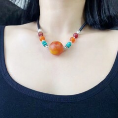 レトロな民族風の松石の蜜ろうの鎖のチェーンのネックレスの女性のボールの手織りのセーターのチェーンのペンダント