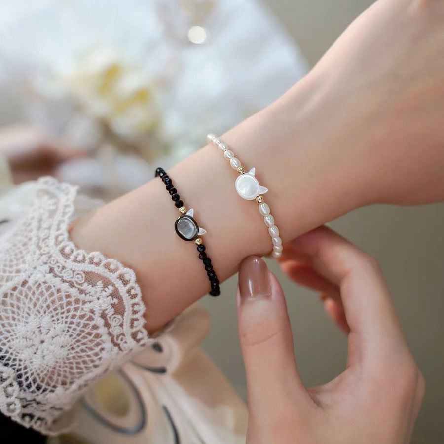 New fresh black and white cat 14-pack gold bracelet adjustable natural small pearl black spindle Japanese niche