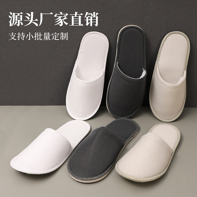 オールシーズン対応のホテル用の本物の美しい布製スリッパ、B&B用の厚みのある滑り止め底、卸売用の使い捨てスリッパ|undefined