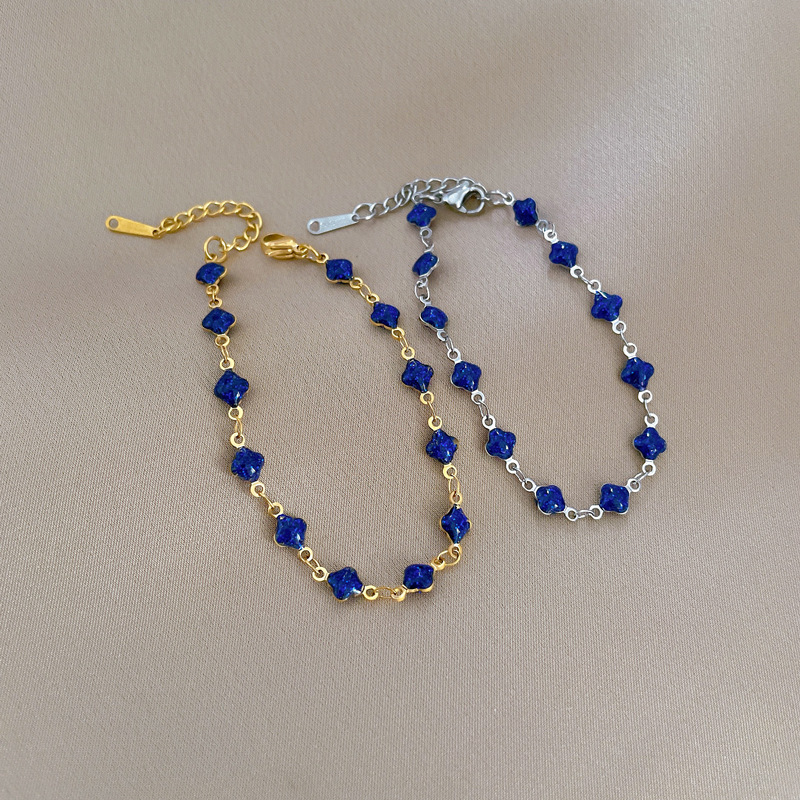 Pulsera de titanio [Acero de titanio de todo el cuerpo] Dongdaemun personalidad estilo simple Lucky Grass pulsera de cadena azul hembra Red rojo retro novias