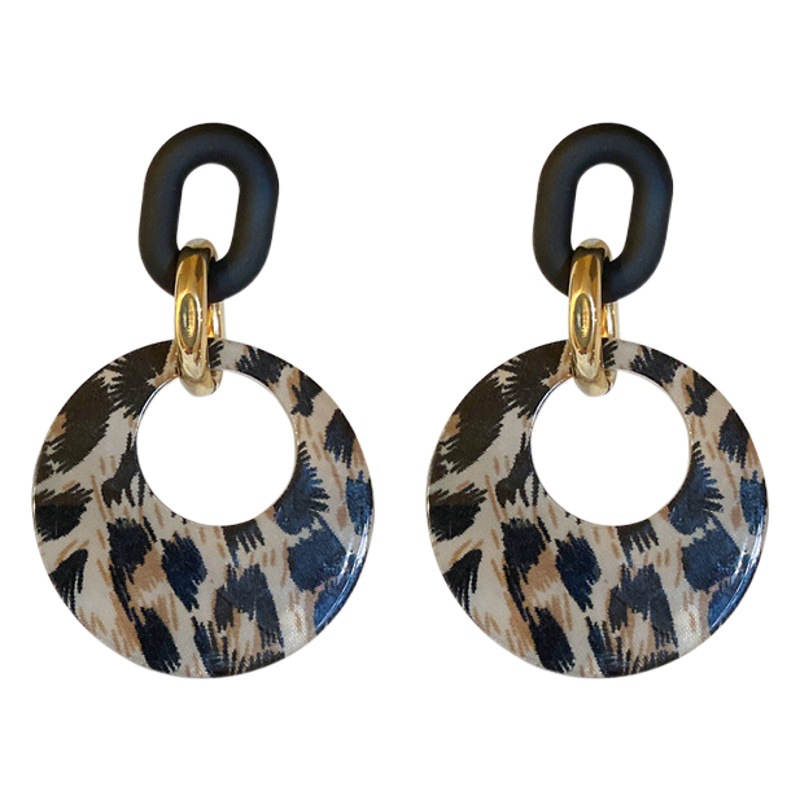 Pendientes de círculo geométrico con estampado de leopardo con aguja de plata Pendientes de personalidad de moda de todo fósforo retro europeo y americano Pendientes de todo fósforo de nicho al por mayor
