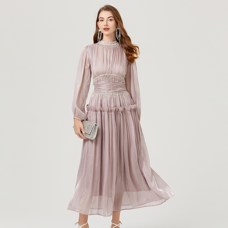 Real Shot of a French-Style Niche Design Dress with Intricate Tassels and Rhinestone Embellishments, Featuring a Luminous Pleated Waist and Extended Length Real Shot of a French-Style Niche Design Dress with Intricate Tassels and Rhinestone Embellishments, Featuring a Luminous Pleated Waist and Extended Length