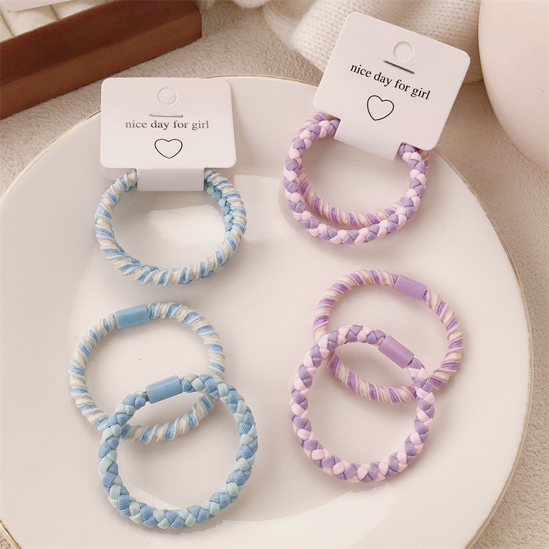 A principios de la primavera nueva cuerda de cabeza de color caramelo anillo de cabello coreano de niña de alta elasticidad universal cola de caballo cuerda de cabello adornamiento para el cabello