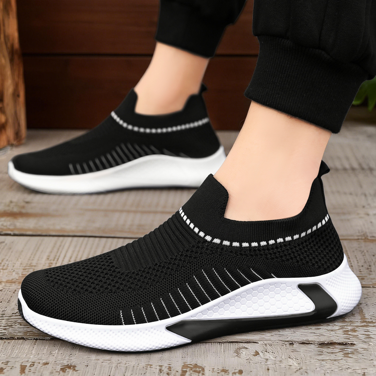 Zapatos de moda coreana para hombres zapatos casuales ligeros transpirables de un pie zapatos de tela de cabello transfronterizos zapatos de tela voladora zapatos de papá