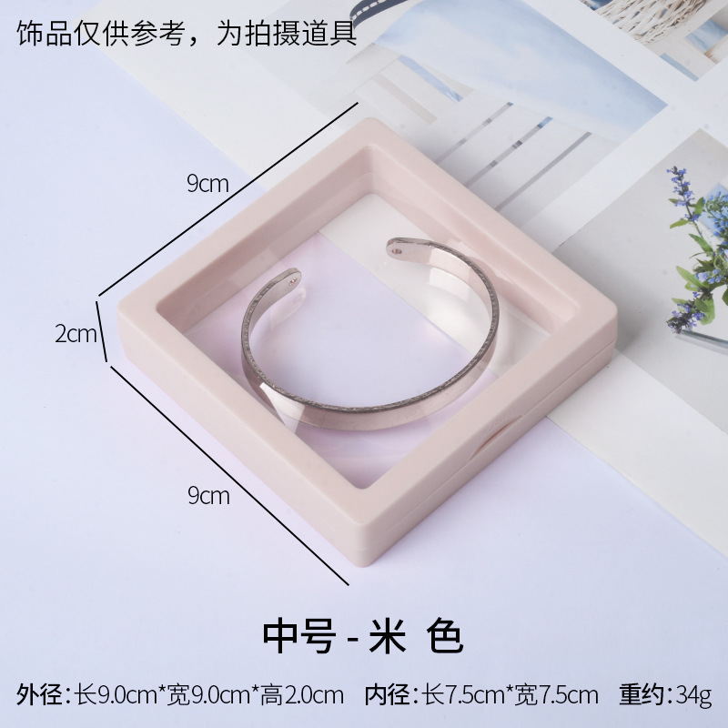 Medium size-beige; pe film suspended display box