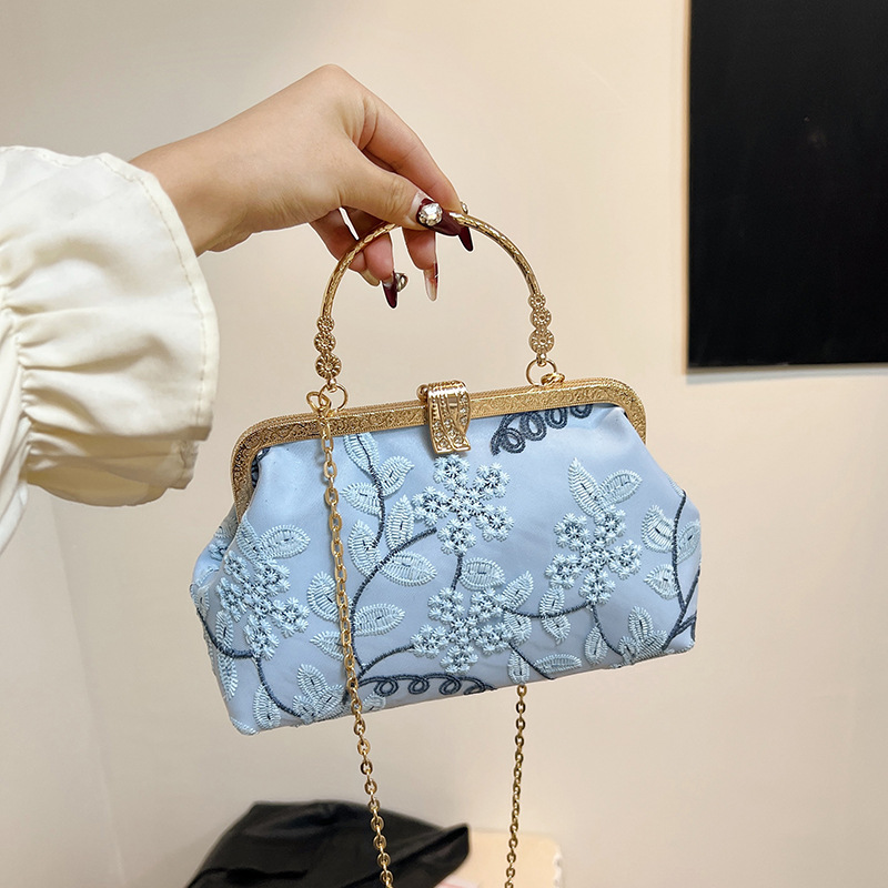Bolso de mujer bordado tridimensional flor abrazadera bolsa conchas 2024 primavera nueva cadena de hombro bolso de hombro
