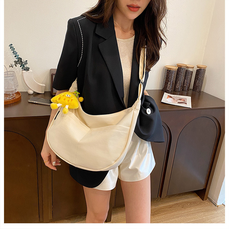 Simple solid-color canvas bag 2024 new style Japanese large-capacity single-shoulder dumpling bag, versatile for school and commuting crossbody bag undefined